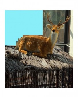 Addobbo natalizio animale renna bambi seduta naturale addobbo natele negozio